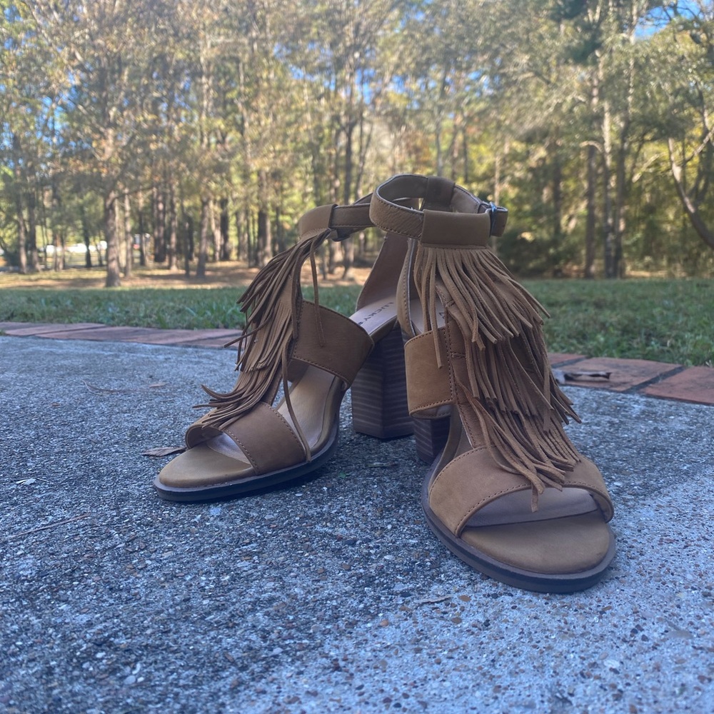 High heeled, fringed sandal